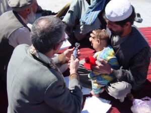 Born in Refuge: Helping the Helpless - Doctors in the Middle East administering care to a baby.
