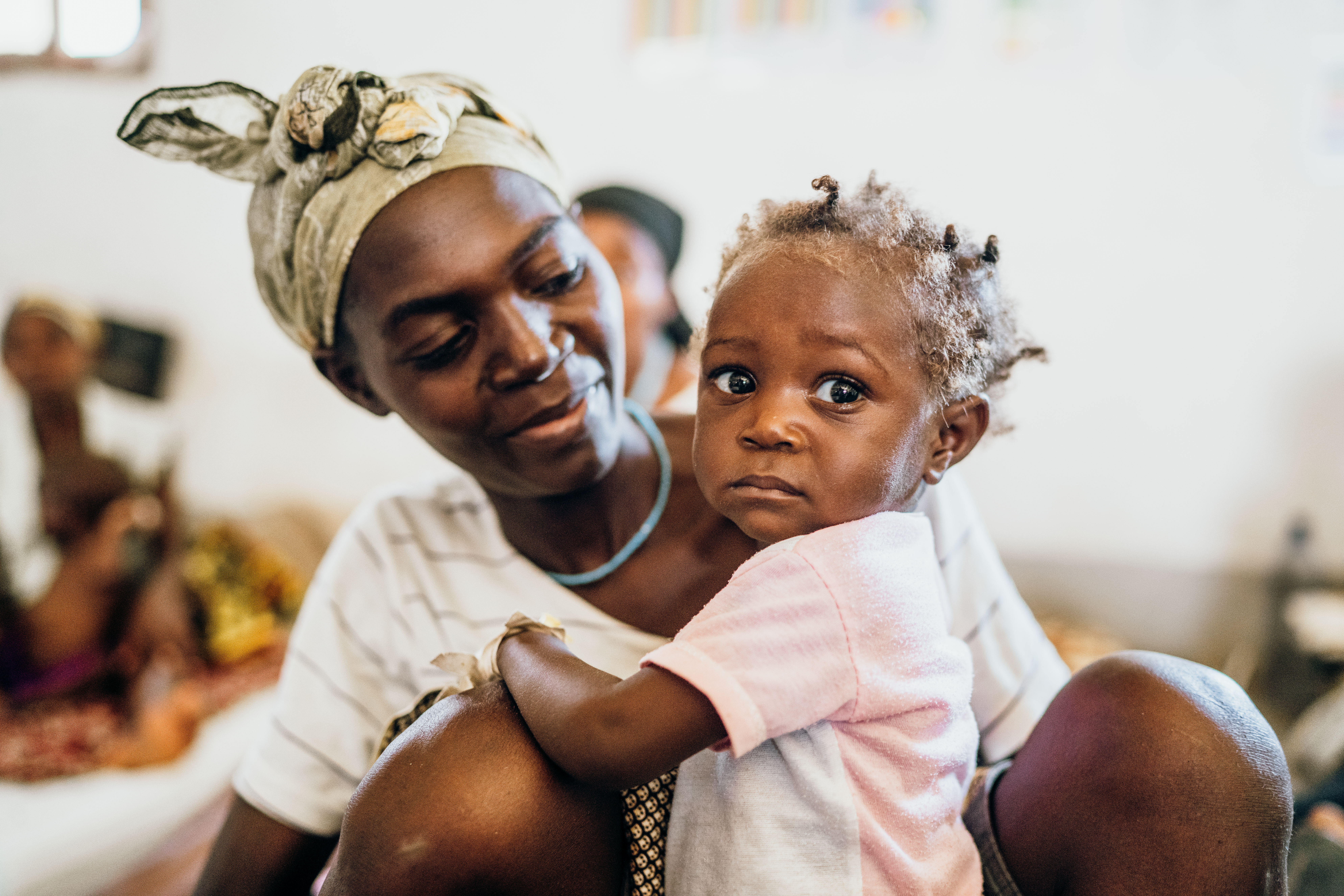 zeferina and her mother at a malnutrition feeding clinic in Angola